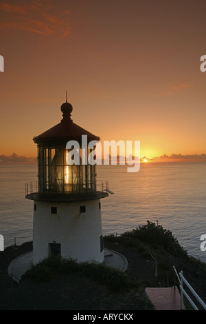 Makapuu pt. lighthouse at sunrise. Located along the southeast coast of oahu. Stock Photo