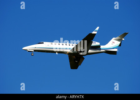 Learjet 45 aircraft G JETA approaching Birmingham International Airport, England, UK Stock Photo