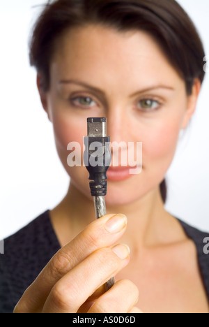 woman, girl with cable connector Stock Photo