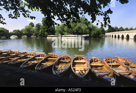 Moored rowing boats at Stratford upon Avon with Clopton Bridge in the distance Stock Photo