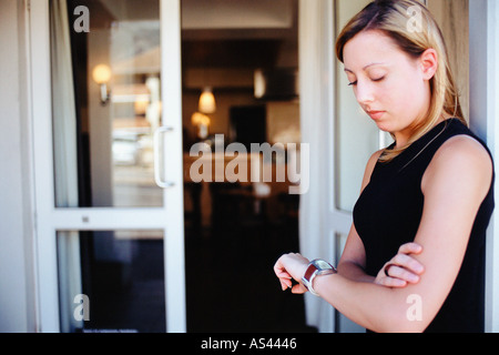 Young woman waiting outside