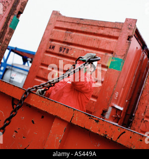 Construction worker holding chain Stock Photo
