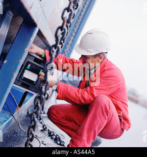 Engineer working on machine Stock Photo