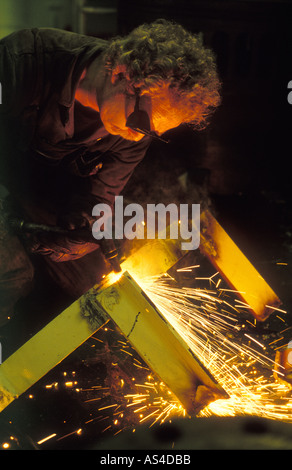 Man using gas cutter Avonmouth UK Stock Photo