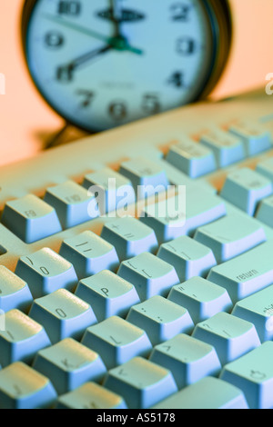 Keyboard with alarm clock Stock Photo - Alamy