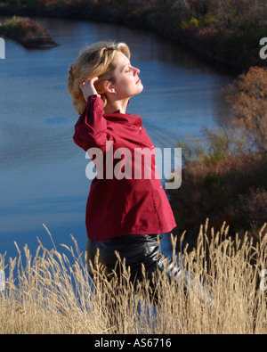 Pretty Woman enjoying the sun in Moose Jaw in scenic Saskatchewan Canada Stock Photo