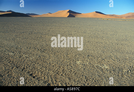 Sand dunes and surrounding desert at sunrise Namib Naukluft National ...