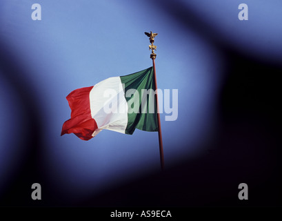 the italian flag tricolour flying on top of II vittoriano in rome italy Stock Photo