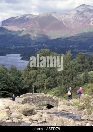 Ashness Bridge Keswick Lake District famous old packhorse bridge and views towards Derwent water Whinlatter and Skiddaw ramblers Stock Photo