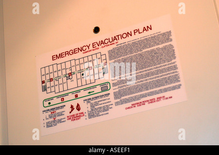 Emergency Evacuation Plan Sign in Hotel Room Stock Photo