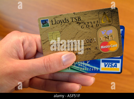 Womans Hand Holding Credit Cards Stock Photo