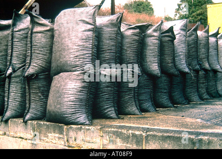 Coal bags awaiting delivery Stock Photo