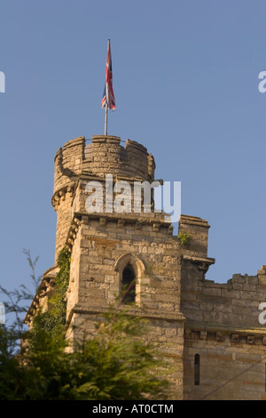 Union Jack Flag flying over Lincoln Castle tower, Lincolnshire, England. Stock Photo