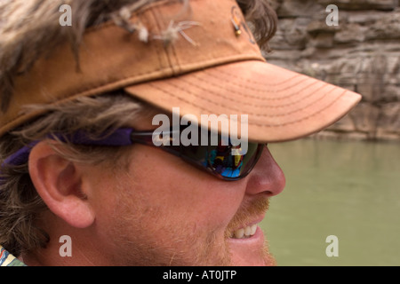 Man rows raft in Grand Canyon National Park MR Stock Photo