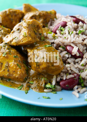 Curried chicken rice and peas Stock Photo