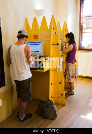 People using internet access computers Cesky Krumlov Czech republic Stock Photo