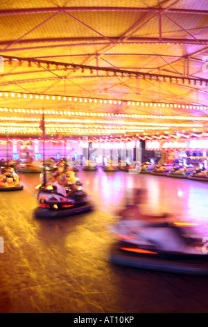 Bumper cars action on the fun fair fairground Stock Photo