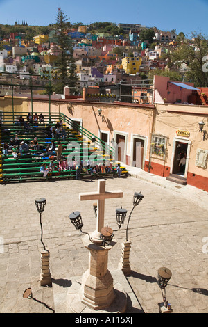 MEXICO Guanajuato Bleachers and cross in Plaza San Roque setting for annual Cervantes Festival houses and buildings on hillside Stock Photo