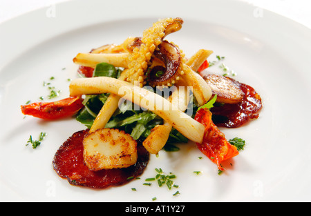 Squid scallop and chorizo salad starter served at Hotel du Vin Bristol England UK Stock Photo