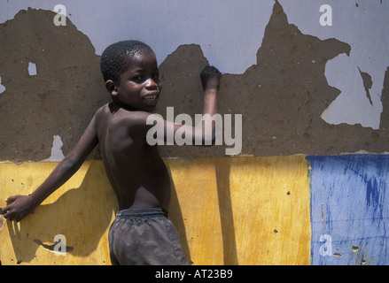 Boy and old house on Mafia Island Indian Ocean Stock Photo