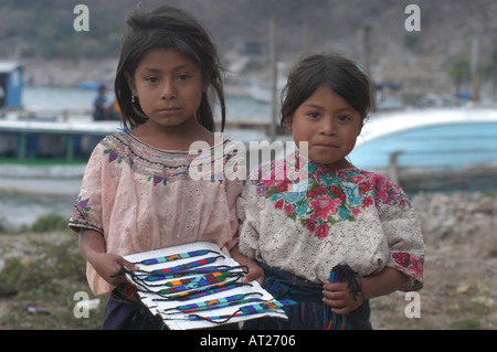 Girls selling crafts Lake Atitlan region Guatemala Stock Photo