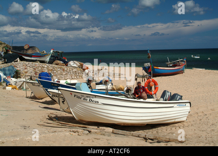 Fishing Boats Beached at Salema Algarve Portugal Stock Photo