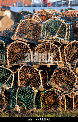 Lobster pots at the harbour on the Holy Island of Lindisfarne, Northumbria, UK Stock Photo