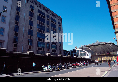 The exterior of Paddington Mainline Station with bikes propped up outside, London UK Stock Photo