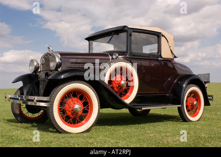 A classic American Model A Ford motor car on grass in the sunshine Stock Photo