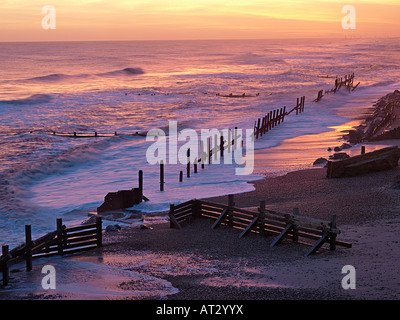 DAWN VIEW FROM HAPPISBURGH CLIFFS AND FAILING SEA DEFENCES, HAPPISBURGH, NORFOLK ENGLAND UK Stock Photo