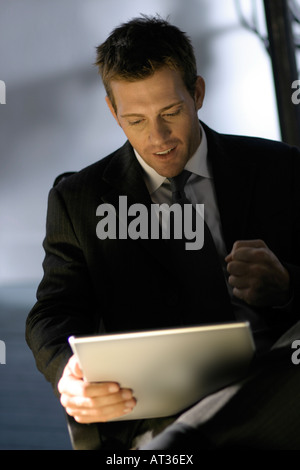 A business man using a laptop Stock Photo