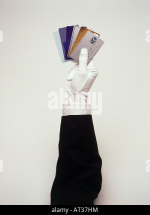 Credit cards in a magicians hand Stock Photo