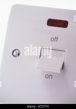 An electrical switch in ON position Stock Photo