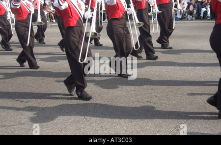 Legs of high school marching band in parade Stock Photo