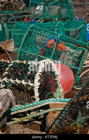 Lobster Pots and Buoys on Scarinish Harbour Wall Stock Photo