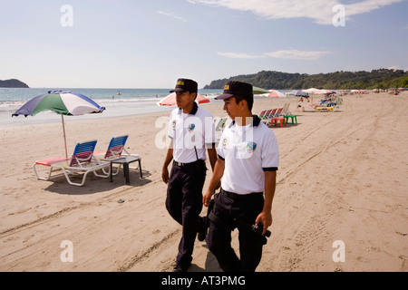 Costa Rica Quepos Playa Espadilla Norte Beach armed tourist police on patrol Stock Photo