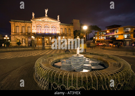 Costa Rica San Jose Plaza de la Cultura fountain in front of Teatro Nacional National Theatre at night Stock Photo