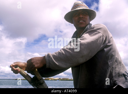 Boatman of the Uros islands Stock Photo