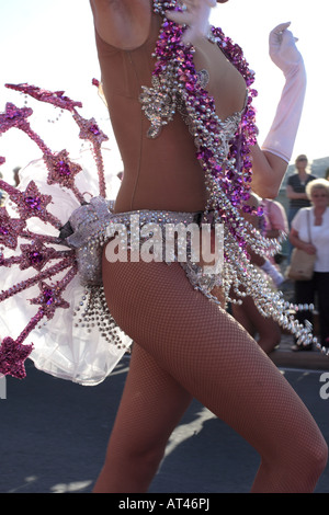 Young dancer swirls her jeweled costume in the Carnaval parade Los Gigantes Tenerife Canary Islands Spain Stock Photo