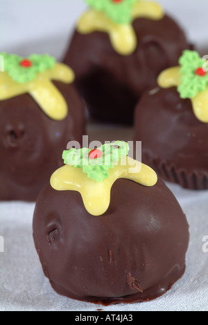 Chocolate Fancy Cakes Shaped Like Christmas Puddings Stock Photo