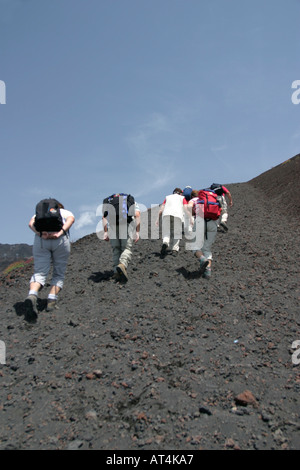 Mount Etna Sicily hikers starting a walk from Refugio Sapienza Stock Photo