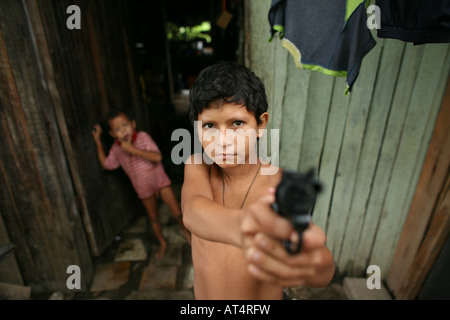 Children joining local gangs who become extremely violent Stock Photo