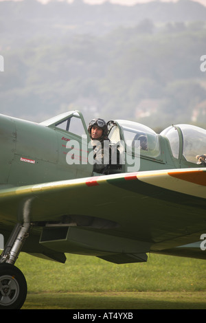 Two seater spitfire taxiing at the Shoreham Air Display 2006. A teddy bear is in the second seat behind the pilot. West Sussex Stock Photo