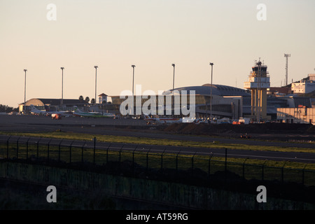 perimeter fence runway and terminal buildings of Los Rodeos Tenerife North TFN airport tenerife canary islands spain Stock Photo