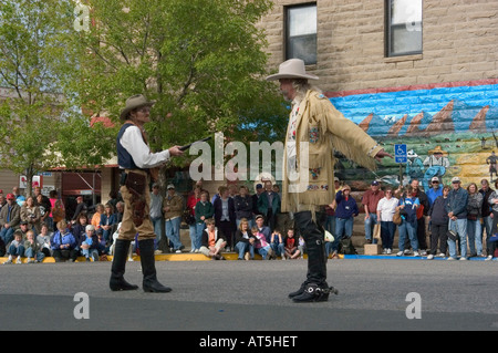 WY Wyoming Cody Buffalo Bill impersonator and villain in shootout Old West Wild West western history historical reenactment Stock Photo