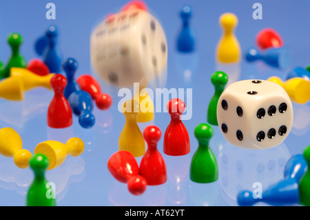 Figurines and dice Stock Photo
