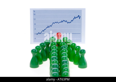 Game pieces in front of graph, close-up Stock Photo