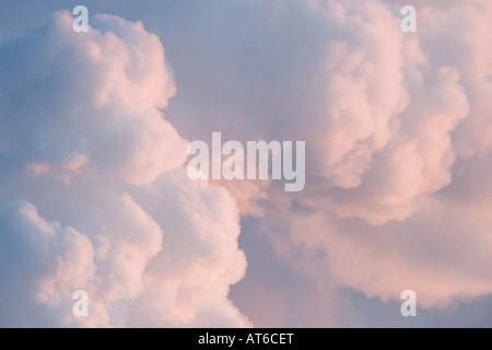 Smoke cloud colored red by sunset Stock Photo