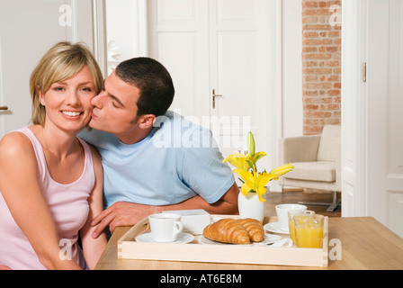 Young couple having breakfast Stock Photo