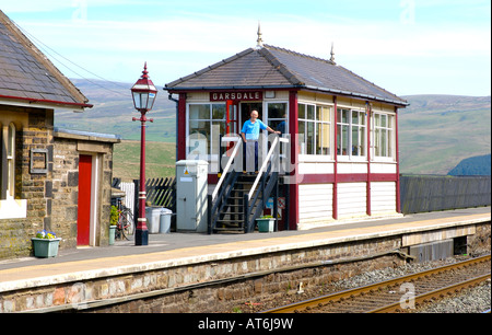 Signal-box (and signal master) at Garsdale station on the famous Settle-Carlisle railway line, Yorkshire Dales National Park UK Stock Photo